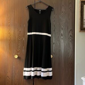 Brand Removed sleeveless black sweater dress with white stripes. Size Medium